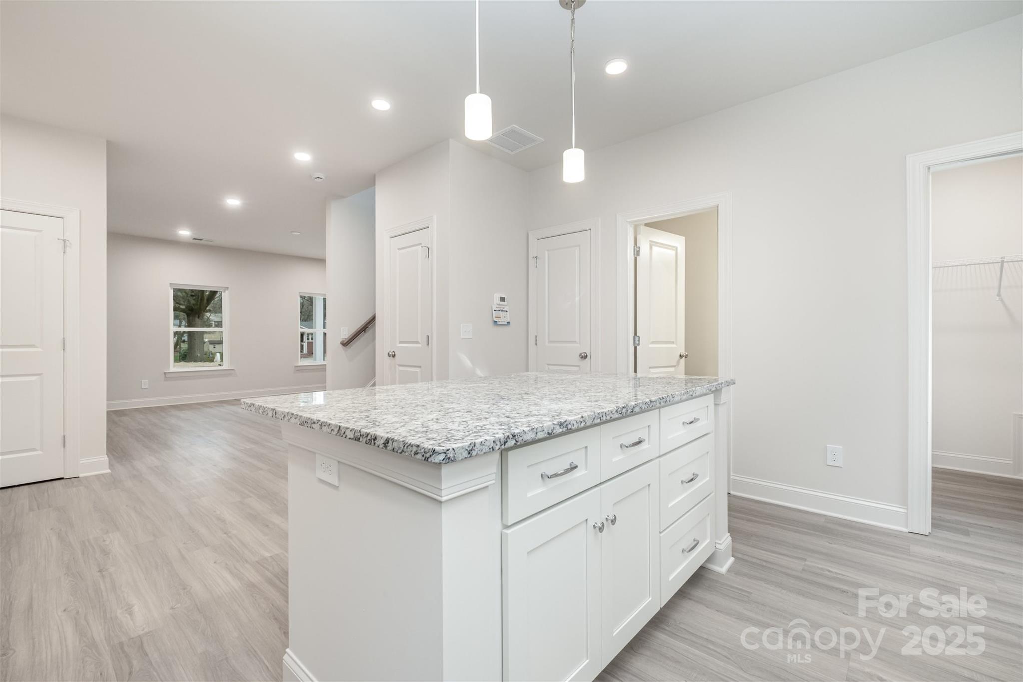 19901 Burton Lane Cornelius, NC 28031 - Photo 9 of 28 a bathroom with a granite countertop sink and a mirror