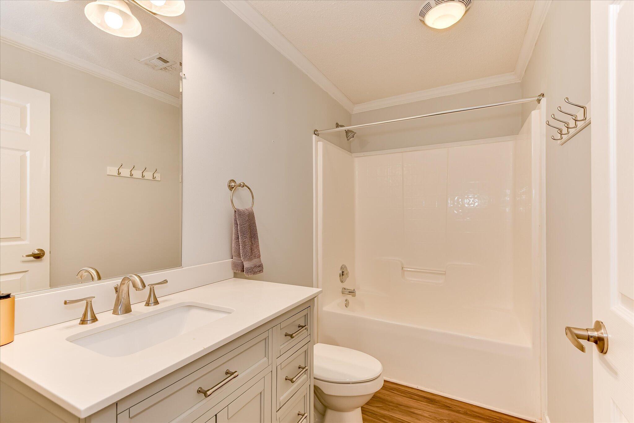1405 Garrett Road Clarks Hill, SC 29821 - Photo 30 of 51 a bathroom with a sink toilet vanity and shower