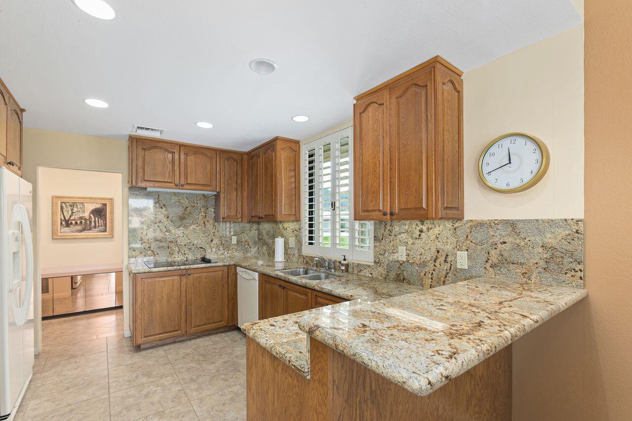 77680 Cherokee Road Indian Wells, CA 92210 - Photo 10 of 27 Kitchen with Granite Slab Counters