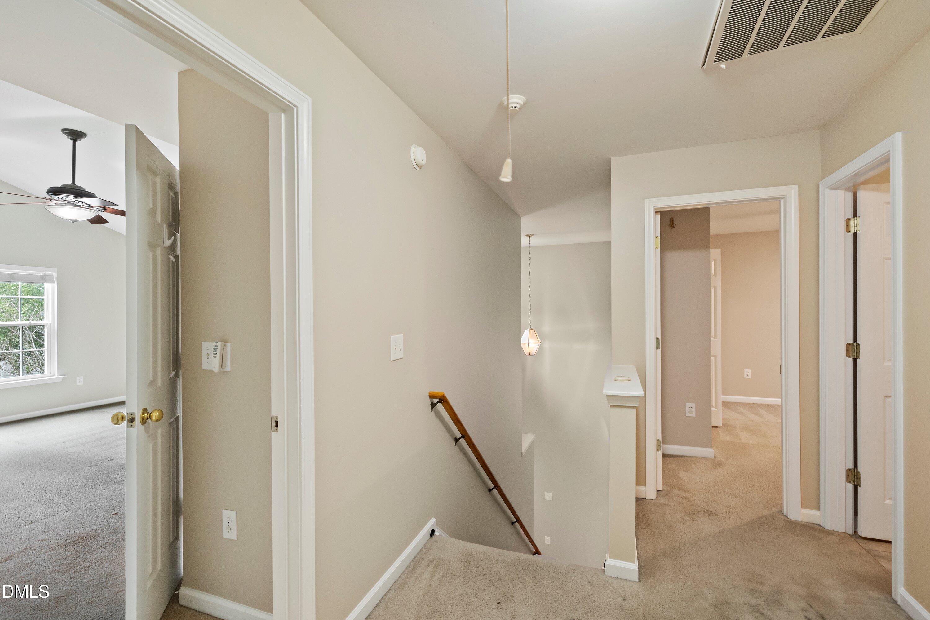 11 Kinglet Court Durham, NC 27713 - Photo 27 of 32 a view of a hallway with closet and entryway