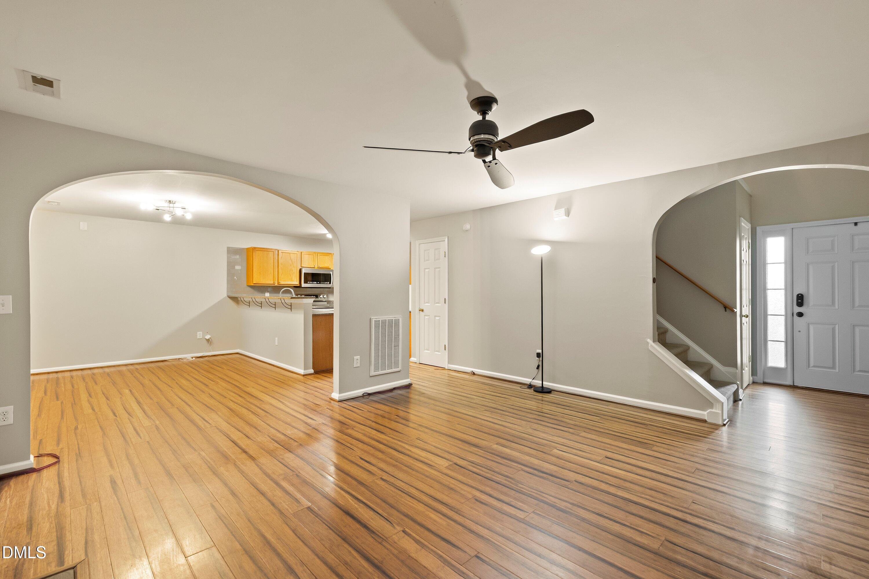 11 Kinglet Court Durham, NC 27713 - Photo 7 of 32 a view of a livingroom with wooden floor