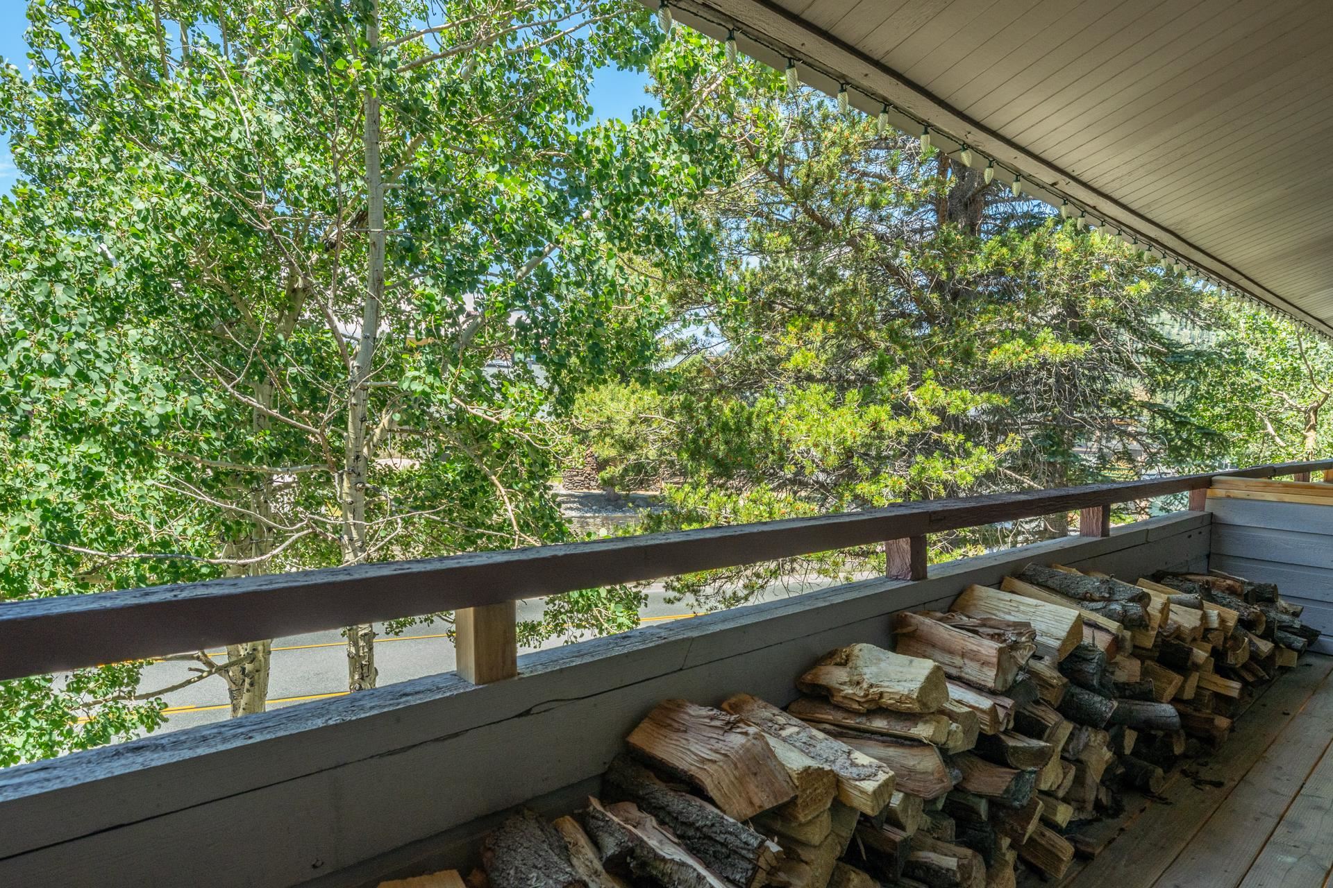 165 Old Mammoth Road, Unit 3 Mammoth Lakes, CA 93546 - Photo 35 of 48 Covered balcony featuring wood decking and a wood railing