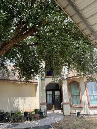 a front view of a house with lake view