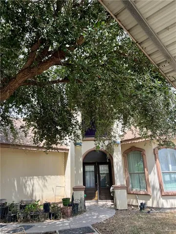 a front view of a house with lake view