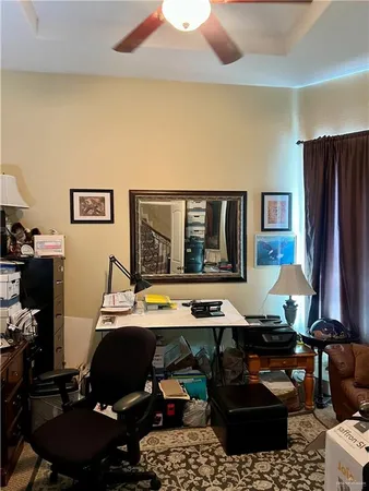 a room with furniture pool table and flat screen tv