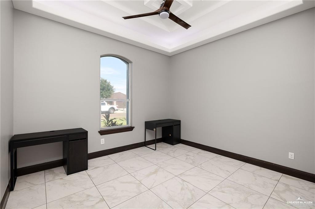1509 Leandro Street Mission, TX 78574 - Photo 8 of 11 a bedroom with a bed and a window