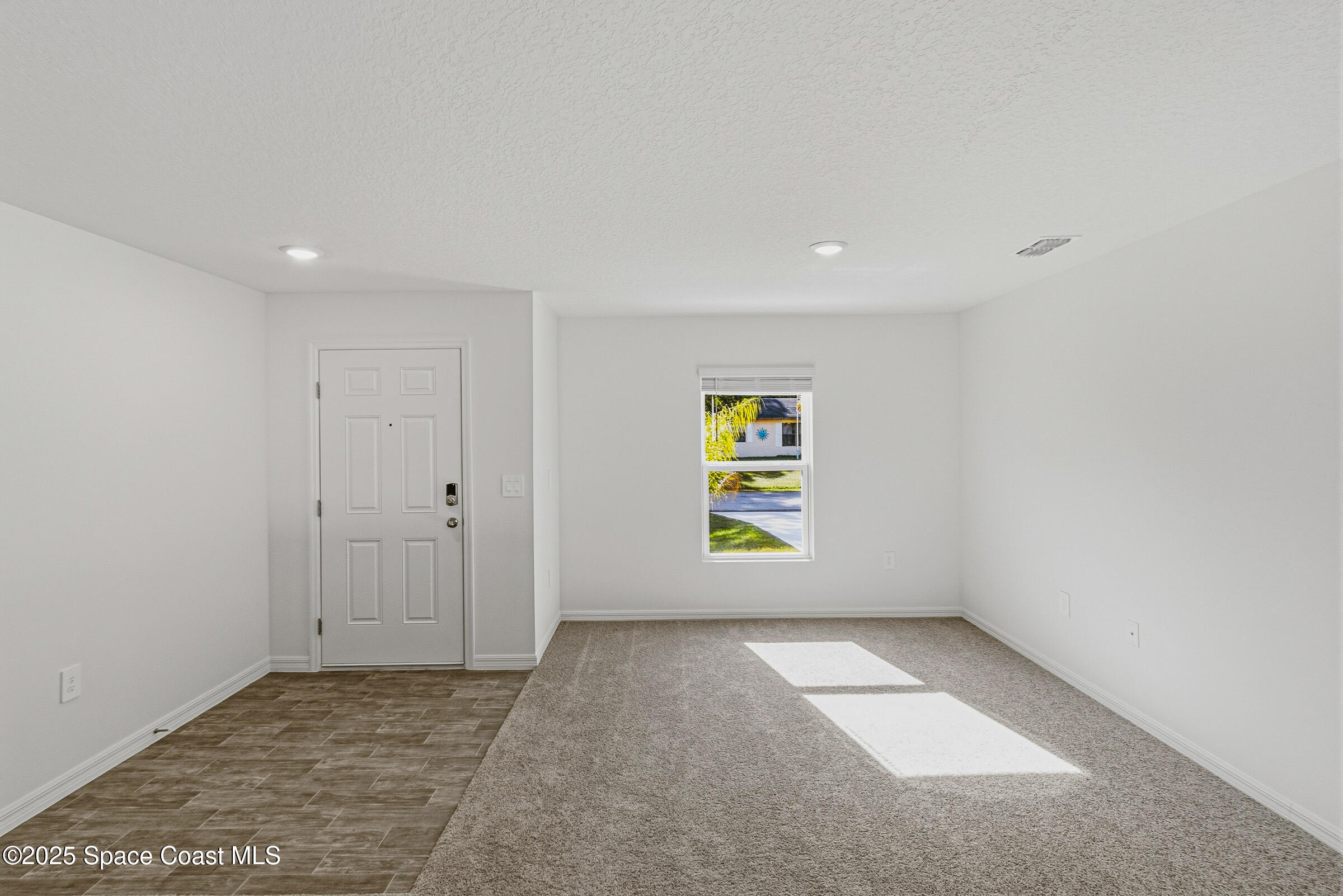 511 Trumpet Street Southwest Palm Bay, FL 32908 - Photo 11 of 43 a view of an empty room