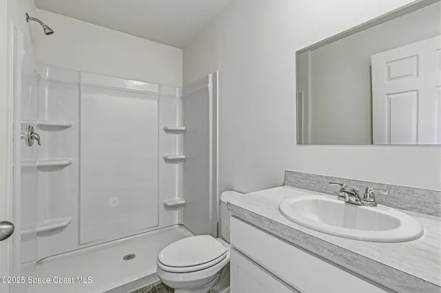 a view of a livingroom with a fireplace