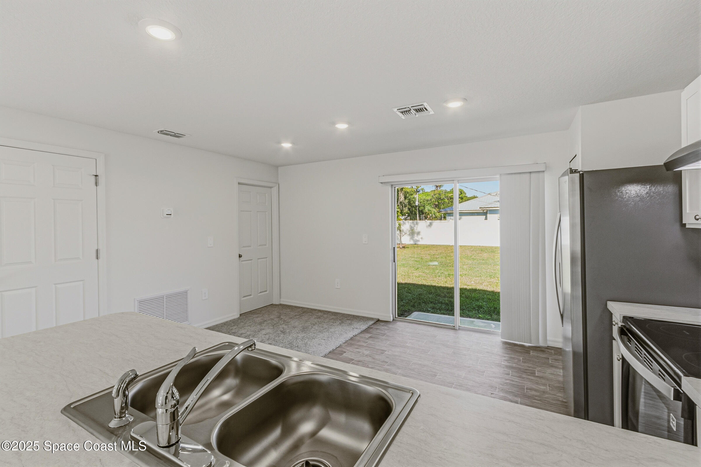 511 Trumpet Street Southwest Palm Bay, FL 32908 - Photo 28 of 43 a view of a livingroom with a fireplace
