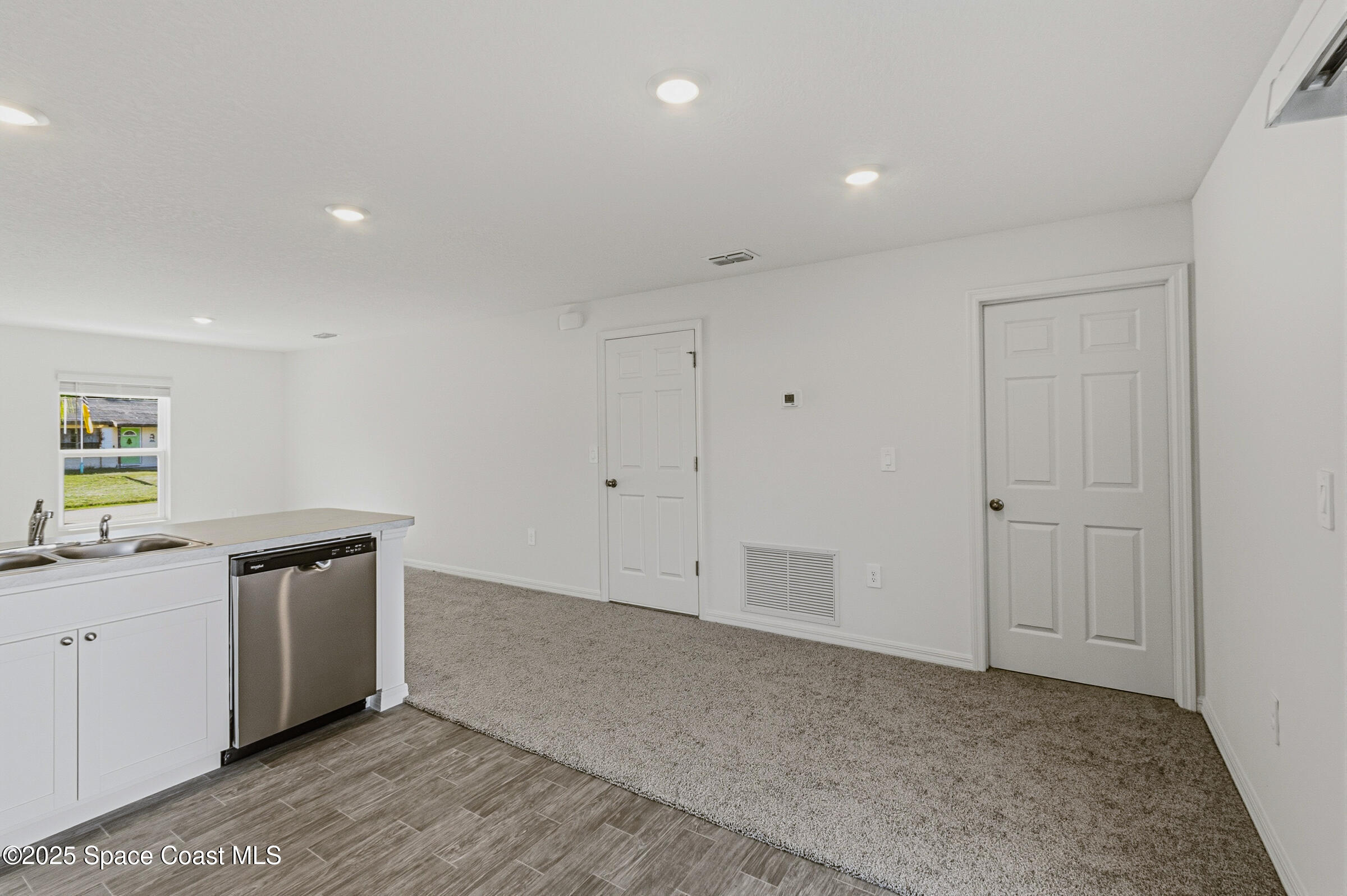 511 Trumpet Street Southwest Palm Bay, FL 32908 - Photo 30 of 43 a view of a kitchen with a sink