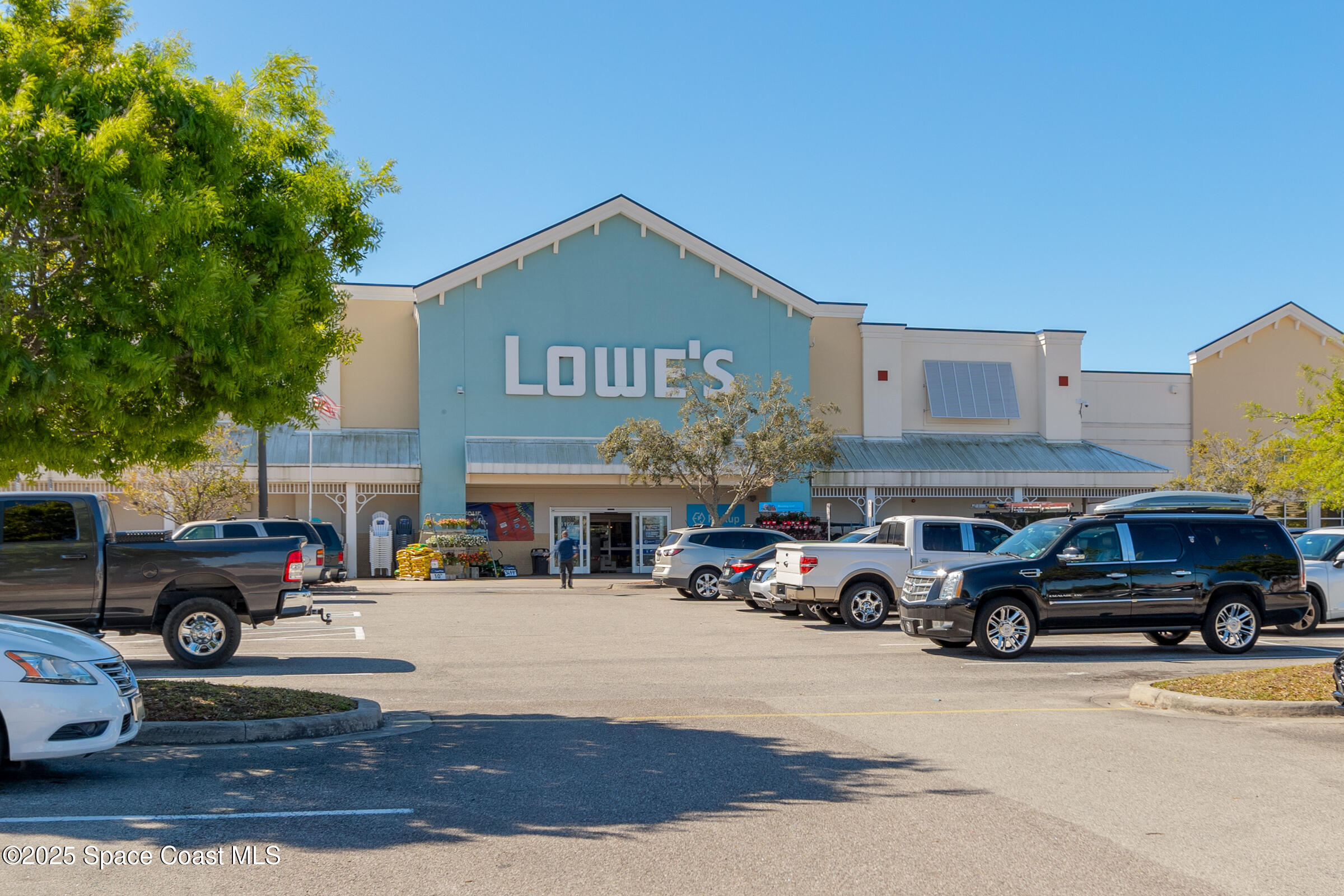 511 Trumpet Street Southwest Palm Bay, FL 32908 - Photo 33 of 43 a car parked in front of a building