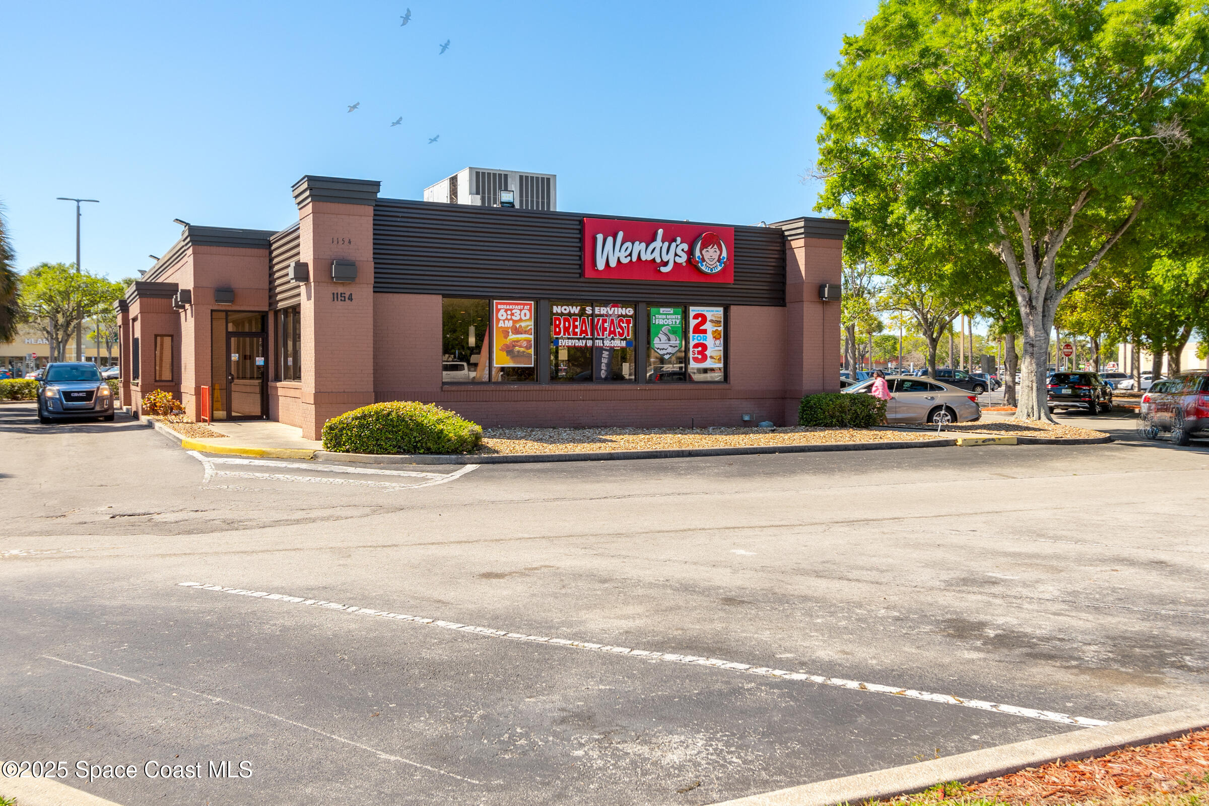 511 Trumpet Street Southwest Palm Bay, FL 32908 - Photo 37 of 43 a sign that is sitting on a street