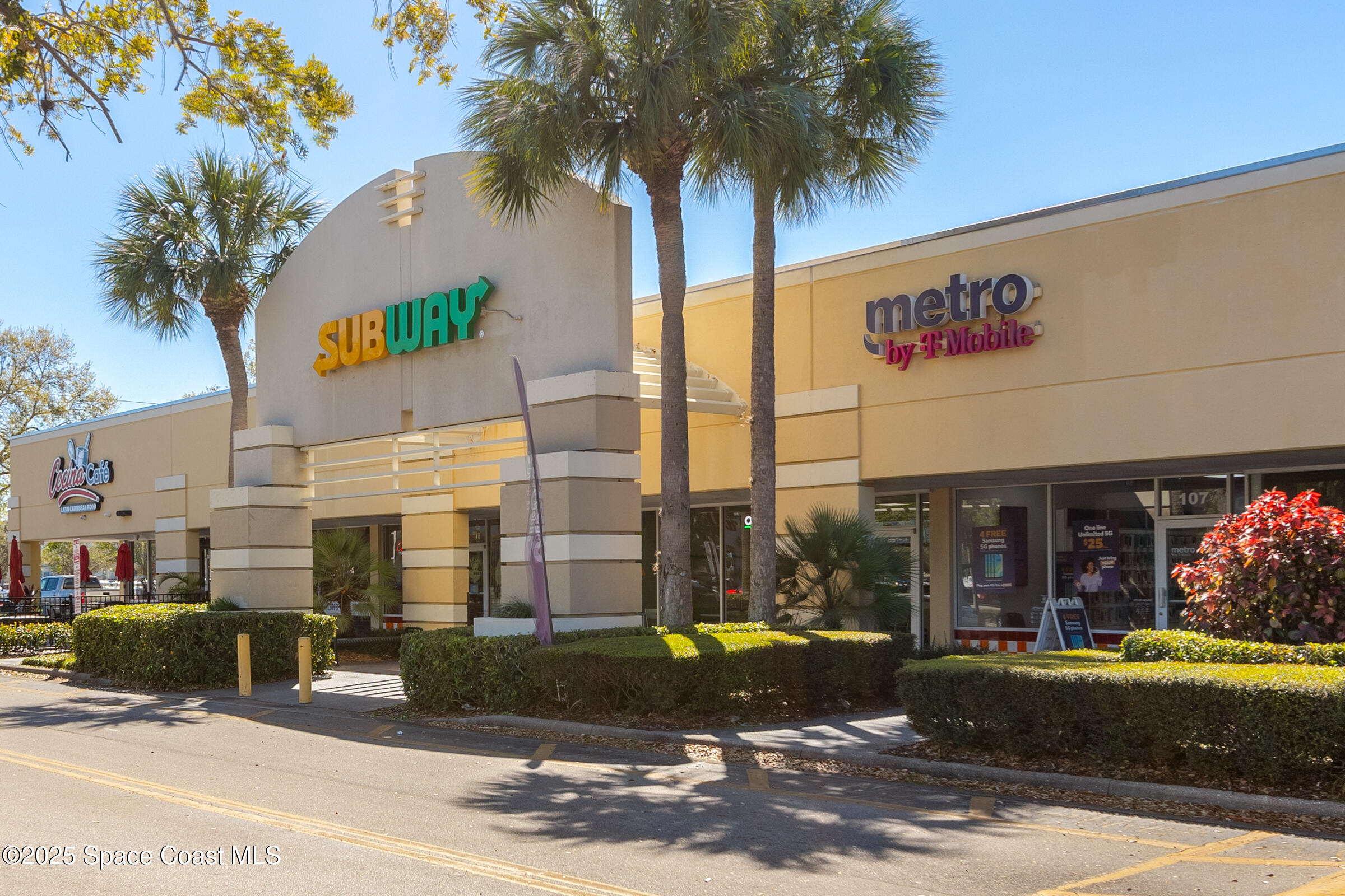 511 Trumpet Street Southwest Palm Bay, FL 32908 - Photo 43 of 43 a sign that is sitting on the side of a street