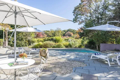 a view of yard with patio