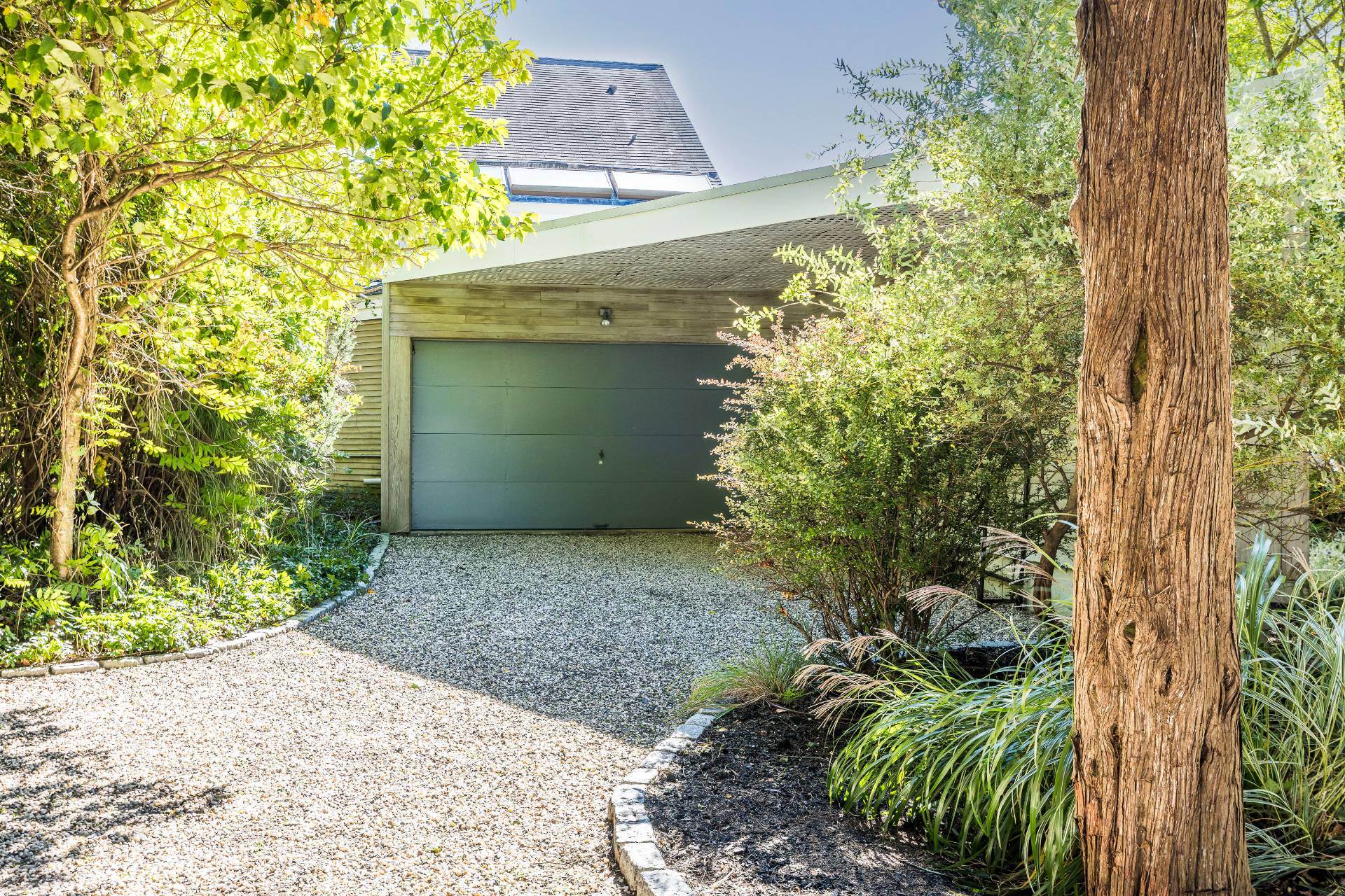 4108 Noyack Road Sag Harbor, NY 11963 - Photo 24 of 26 a view of a garage