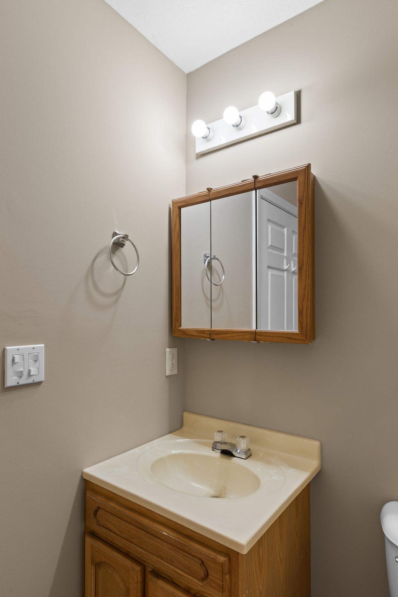 7215 Horn Tavern Road Fairview, TN 37062 - Photo 13 of 14 a bathroom with a sink and a mirror