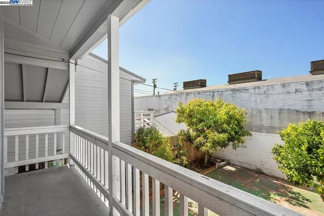 a view of a backyard with a patio