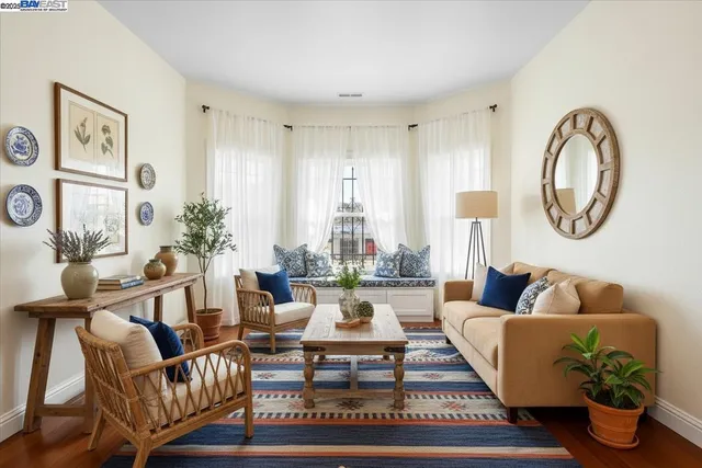 a view of a big room with windows and view of room