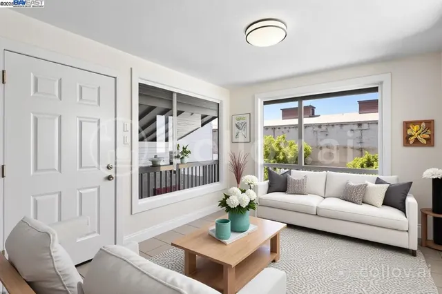 a view of a kitchen with wooden floor
