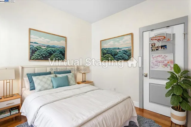 a bedroom with a bed and glass window