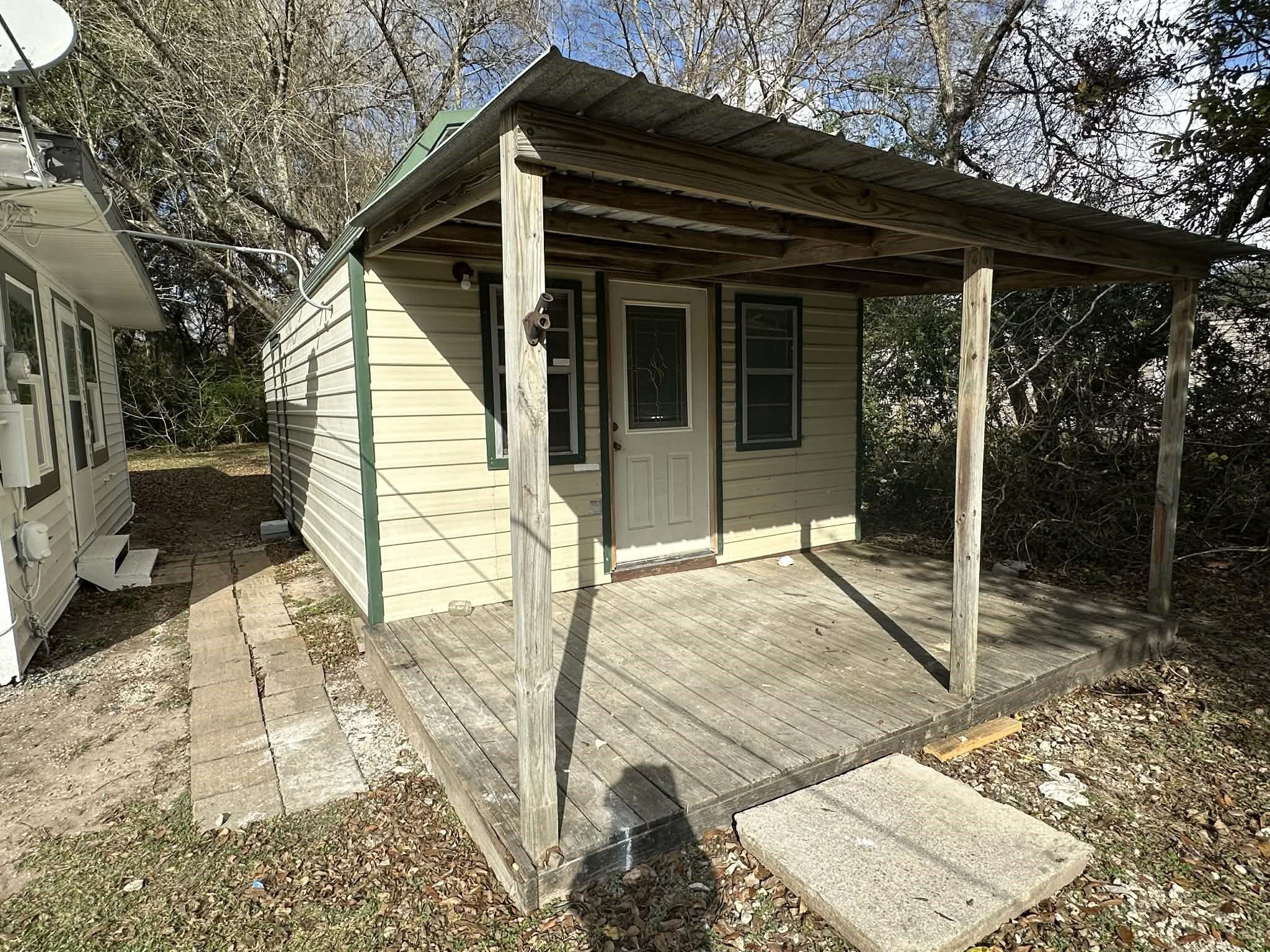 614 Fm 1406 Road Winnie, TX 77665 - Photo 5 of 19 a view of house with backyard