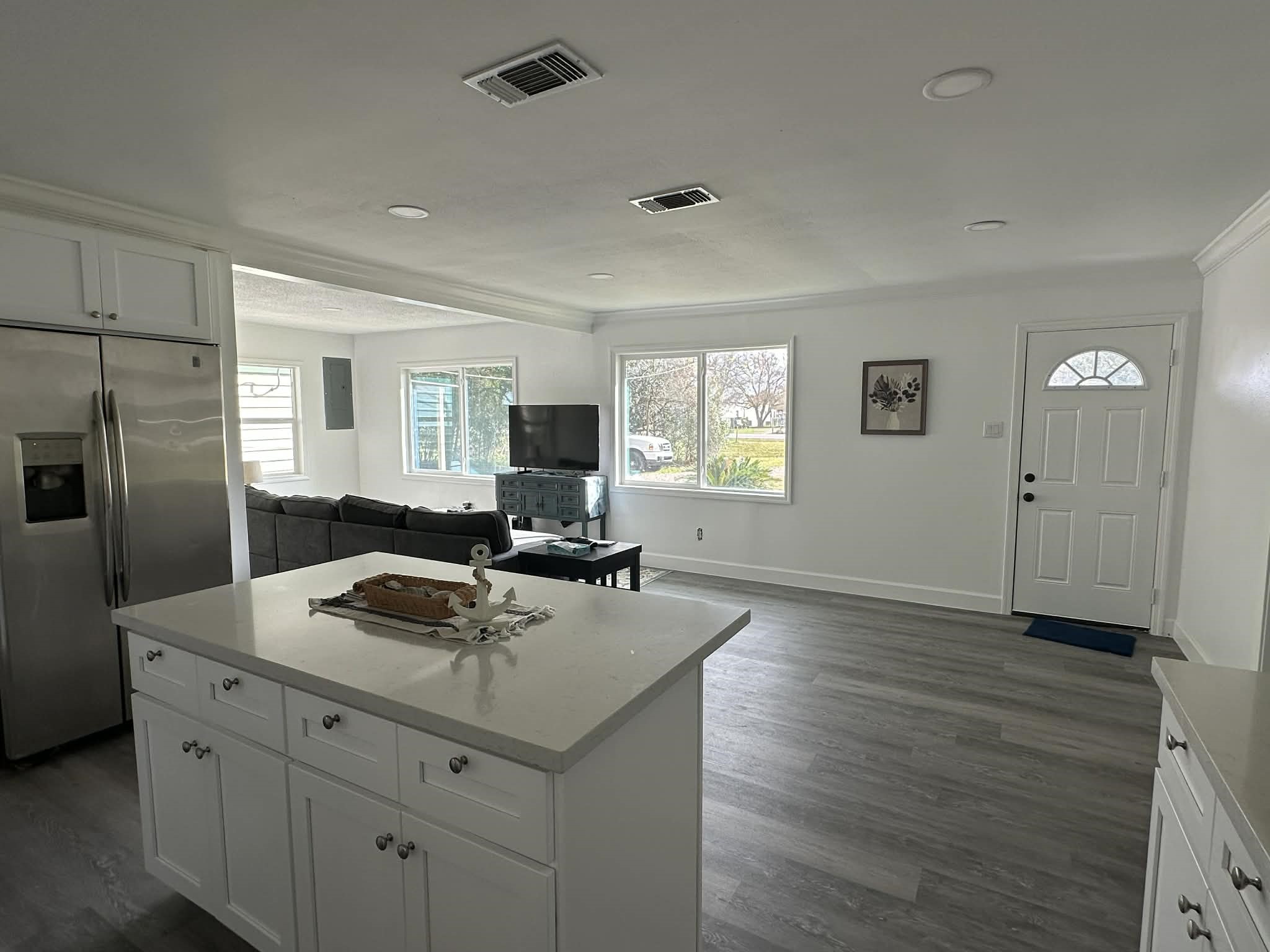 614 Fm 1406 Road Winnie, TX 77665 - Photo 9 of 19 a kitchen with a sink appliances and cabinets