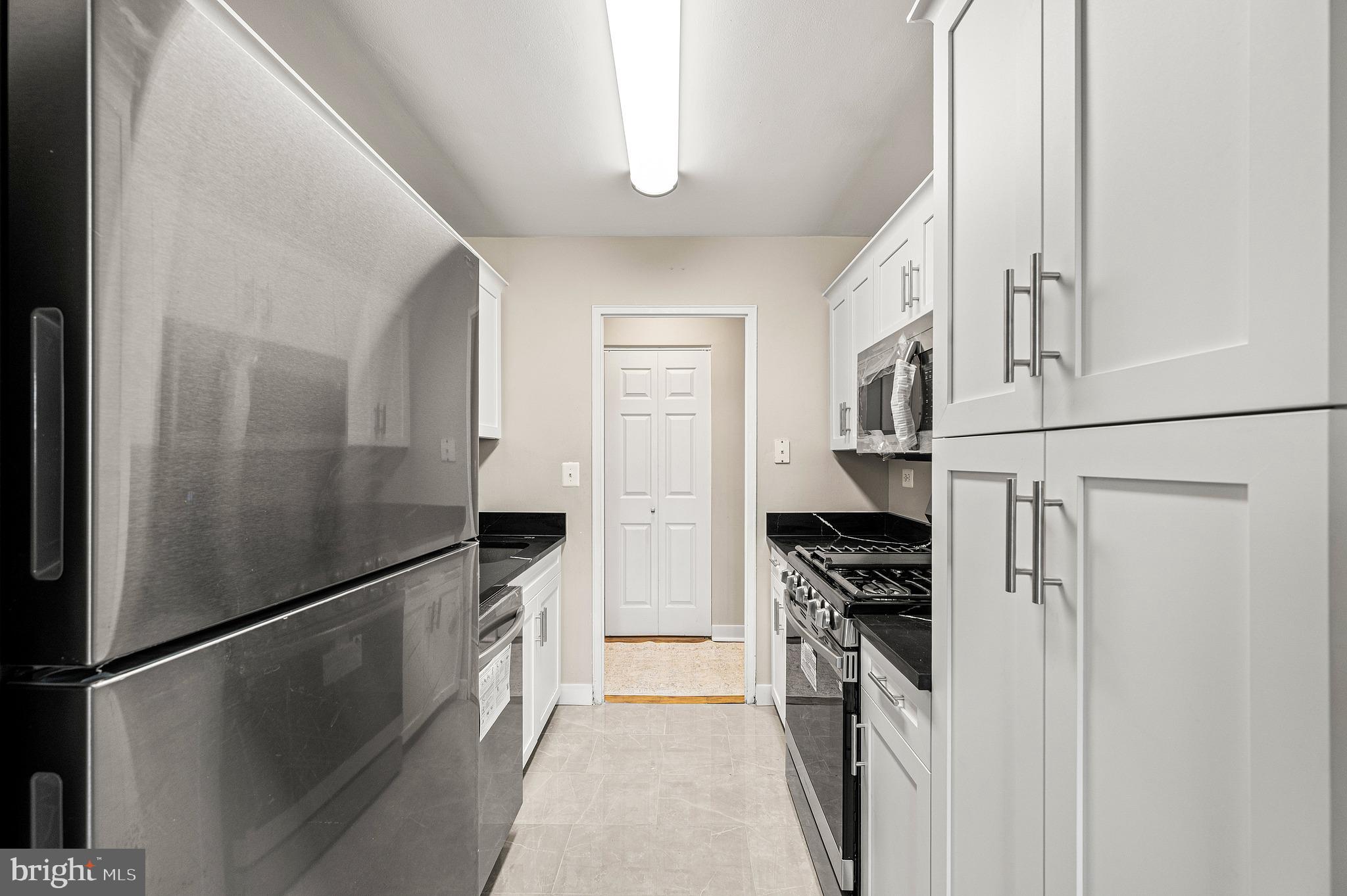 1600 Hagys Ford Road North, Unit 9N Penn Valley, PA 19072 - Photo 16 of 37 Clean modern kitchen new appliances