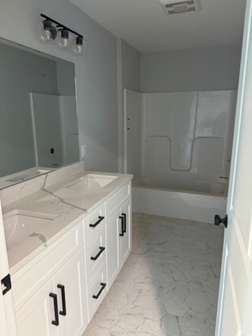 Lot 7 Muriel Way Rehoboth, MA 02769 - Photo 13 of 28 a bathroom with a granite countertop sink and a mirror