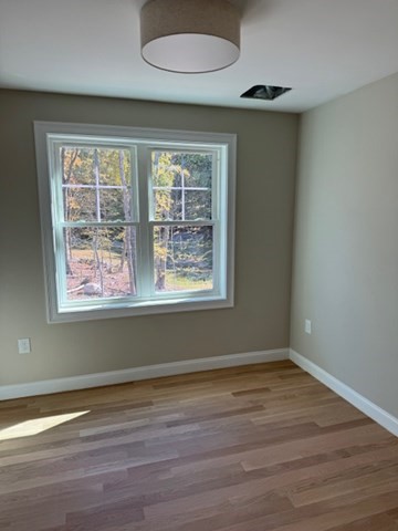 Lot 7 Muriel Way Rehoboth, MA 02769 - Photo 17 of 28 an empty room with wooden floor and windows