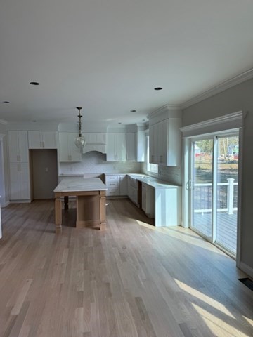 Lot 7 Muriel Way Rehoboth, MA 02769 - Photo 7 of 28 a kitchen with stainless steel appliances granite countertop a stove a sink and a refrigerator
