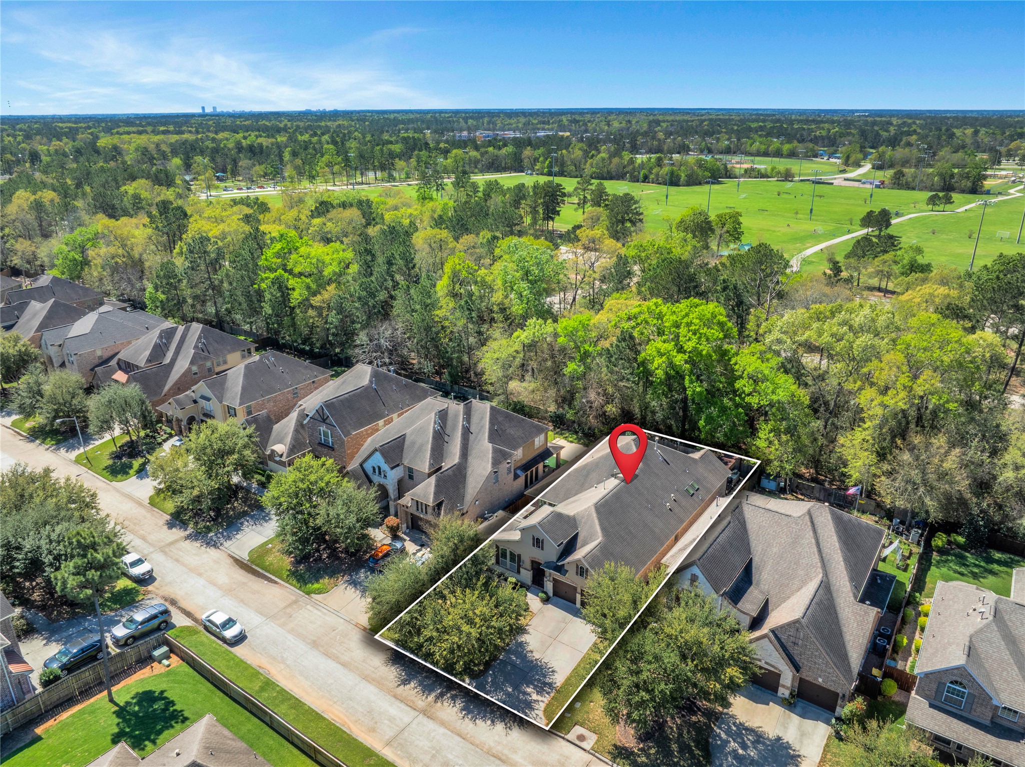 3234 Explorer Way Conroe, TX 77301 - Photo 1 of 44 an aerial view of a house with a yard
