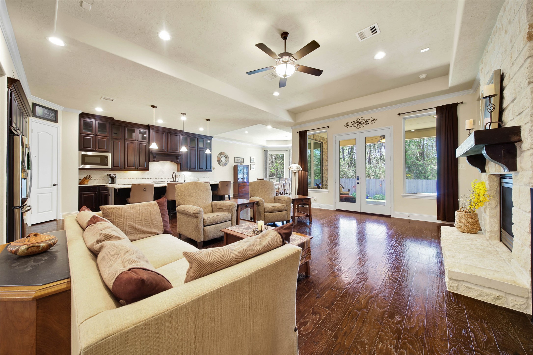 3234 Explorer Way Conroe, TX 77301 - Photo 11 of 44 a living room with furniture and a wooden floor
