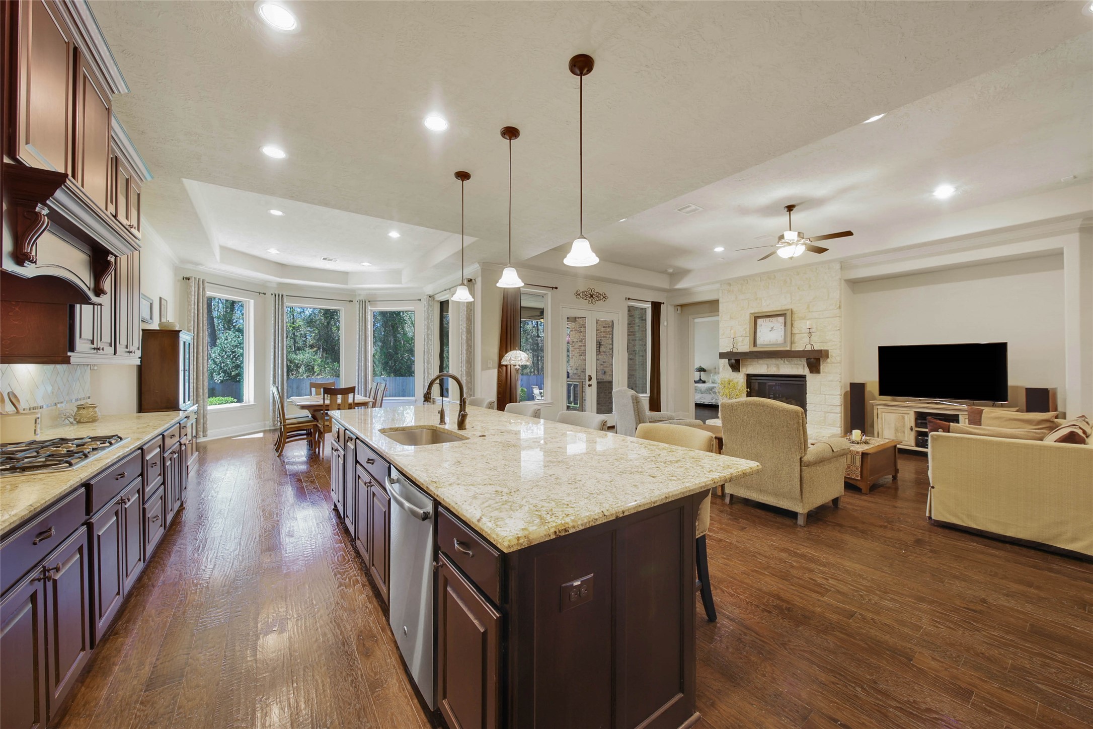 3234 Explorer Way Conroe, TX 77301 - Photo 14 of 44 a large kitchen with lots of counter space and windows