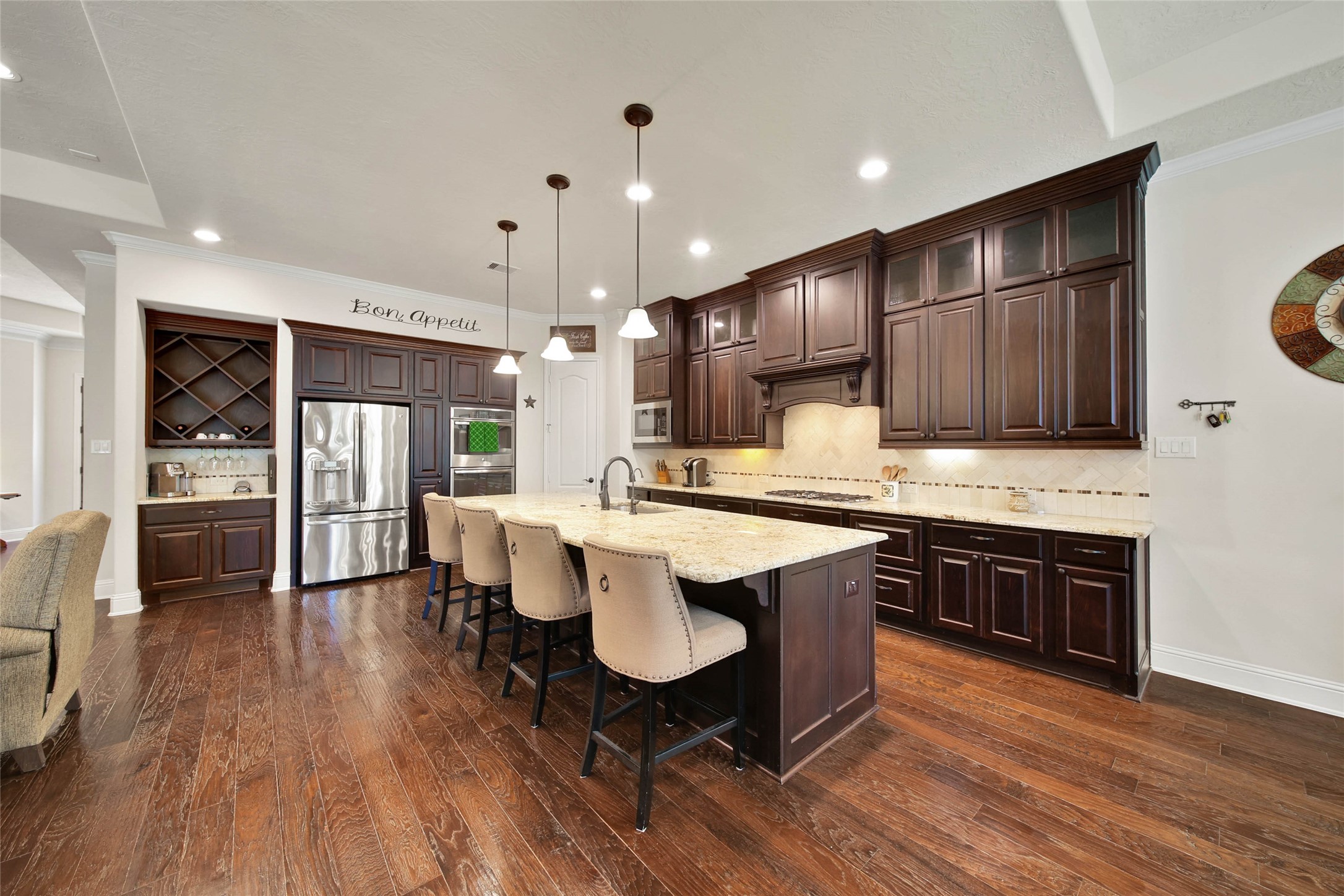 3234 Explorer Way Conroe, TX 77301 - Photo 17 of 44 a large kitchen with a table and chairs in it