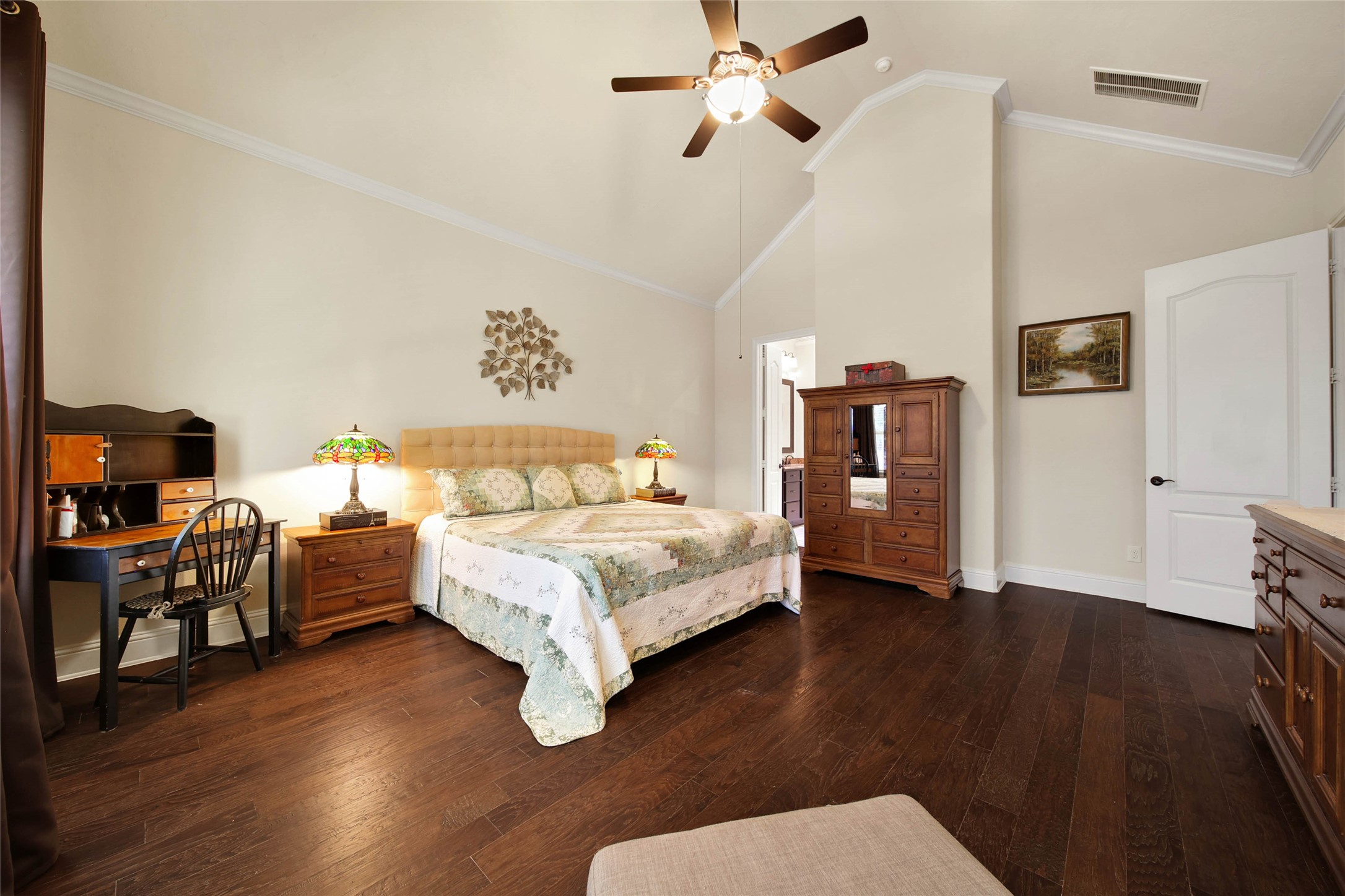 3234 Explorer Way Conroe, TX 77301 - Photo 23 of 44 a bedroom with a bed and wooden floor