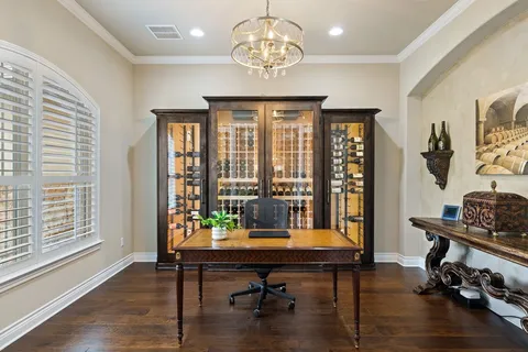 a view of a livingroom with furniture and a window