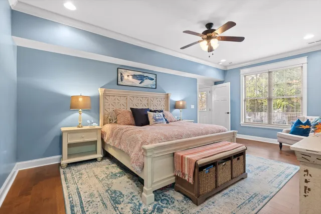 a bed room with a bed and a chandelier