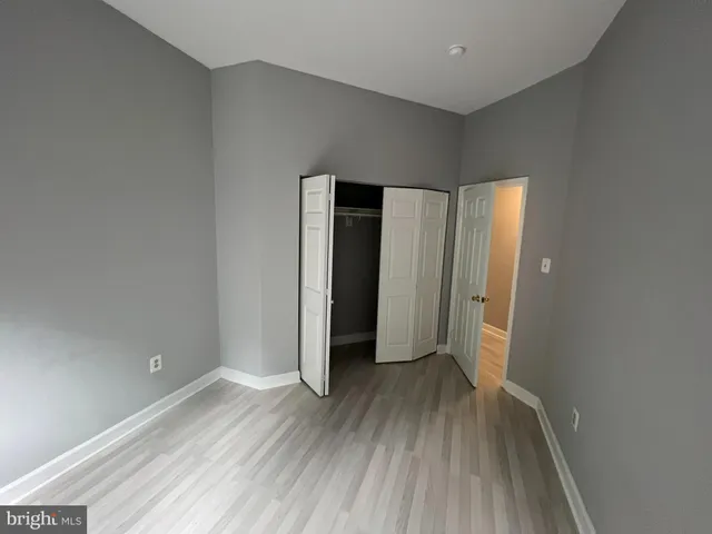 a view of hallway with walk in closet