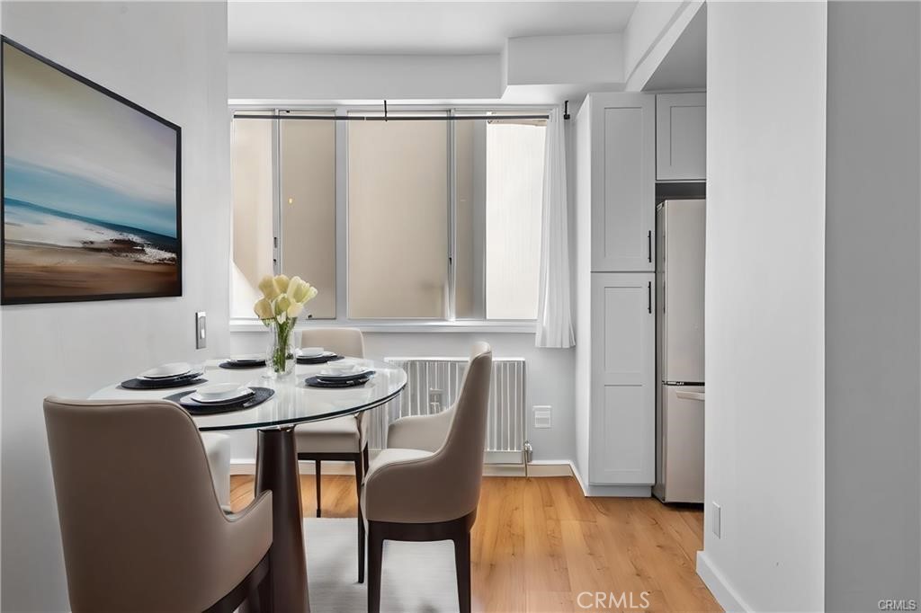 7250 Franklin Avenue, Unit 406 Los Angeles, CA 90046 - Photo 13 of 34 Virtually Staged Dining Room