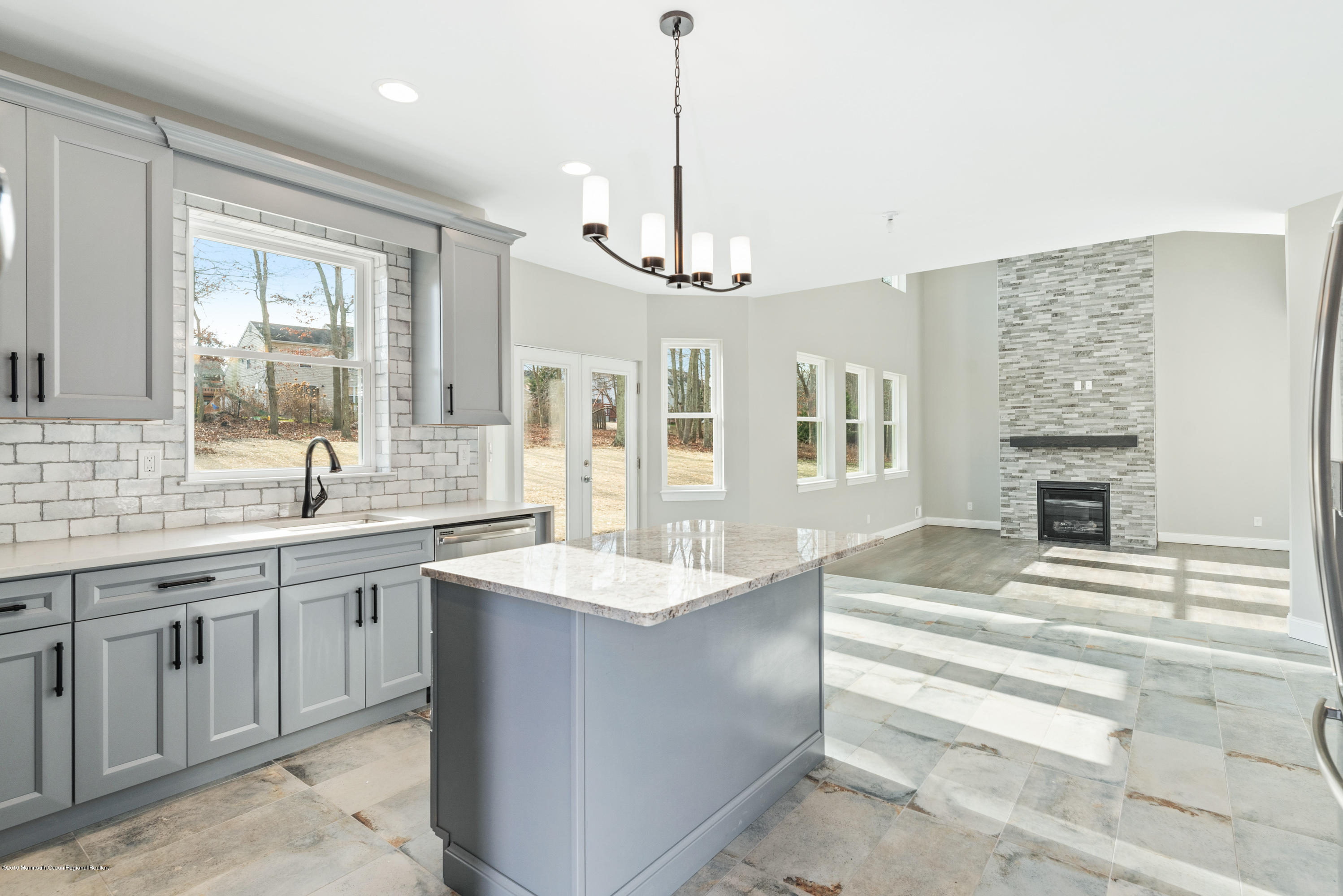 5 Hummingbird Court Howell, NJ 07731 - Photo 5 of 39 Kitchen into Family Room