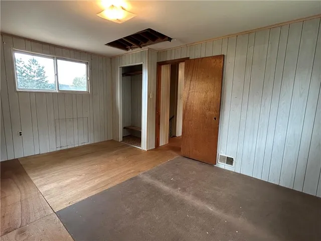 an empty room with windows