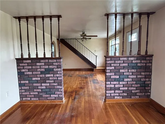 a view of entryway with wooden floor