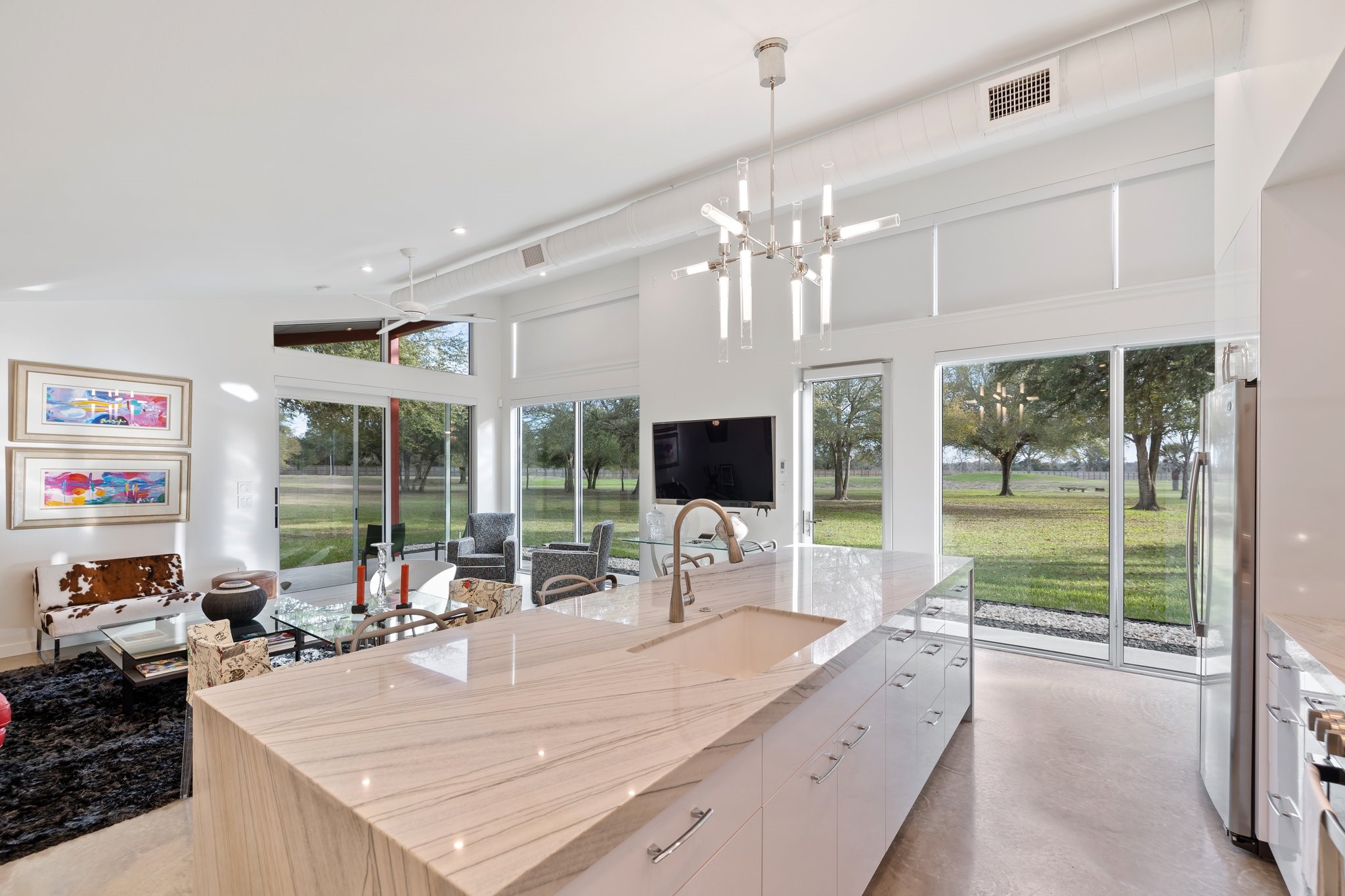 1585 Round Top Road Round Top, TX 78954 - Photo 15 of 30 a view of a living room and kitchen floor