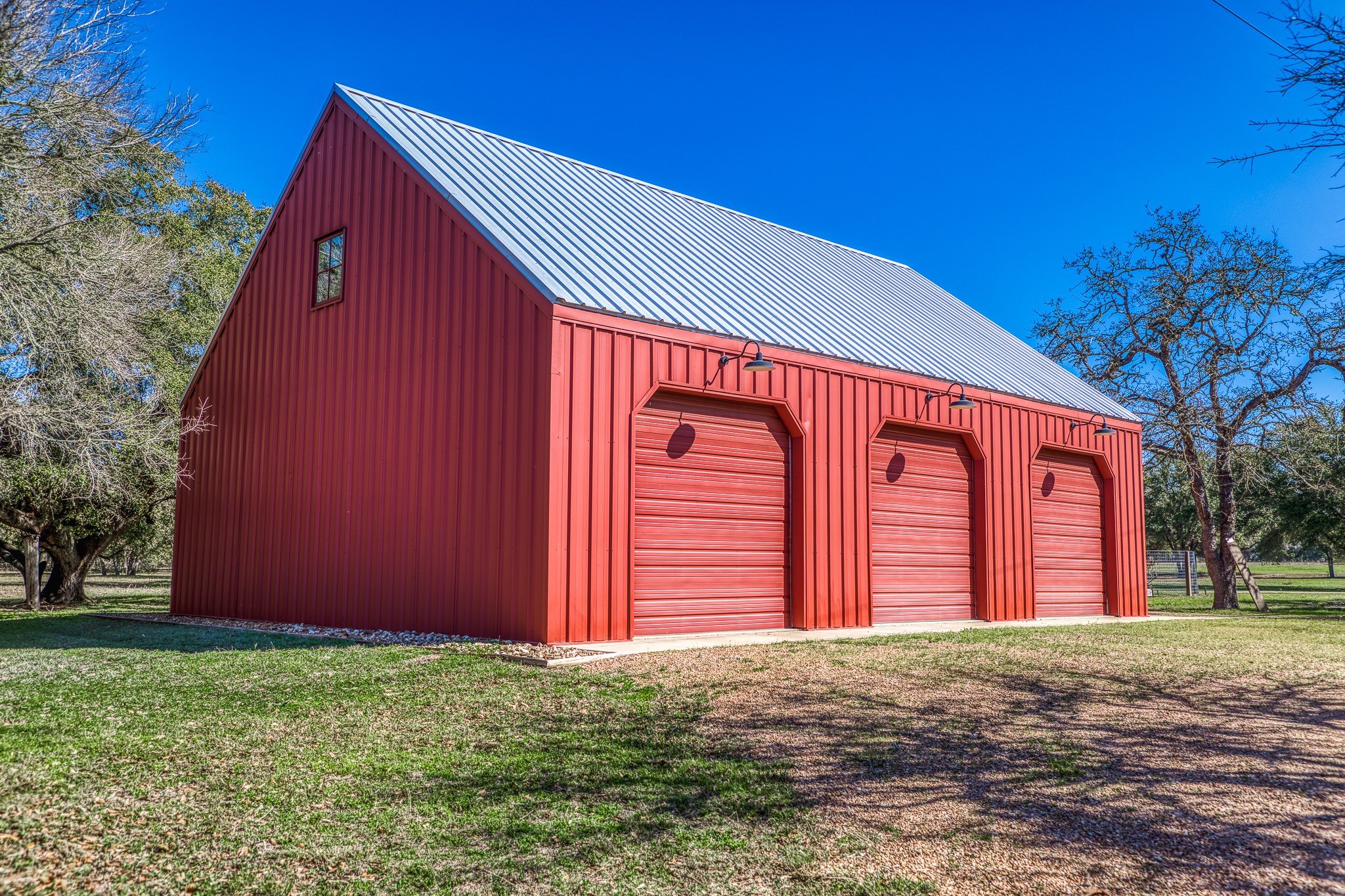 1585 Round Top Road Round Top, TX 78954 - Photo 19 of 30 a front view of a house with a yard
