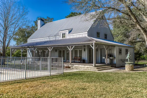 a front view of a house with a porch