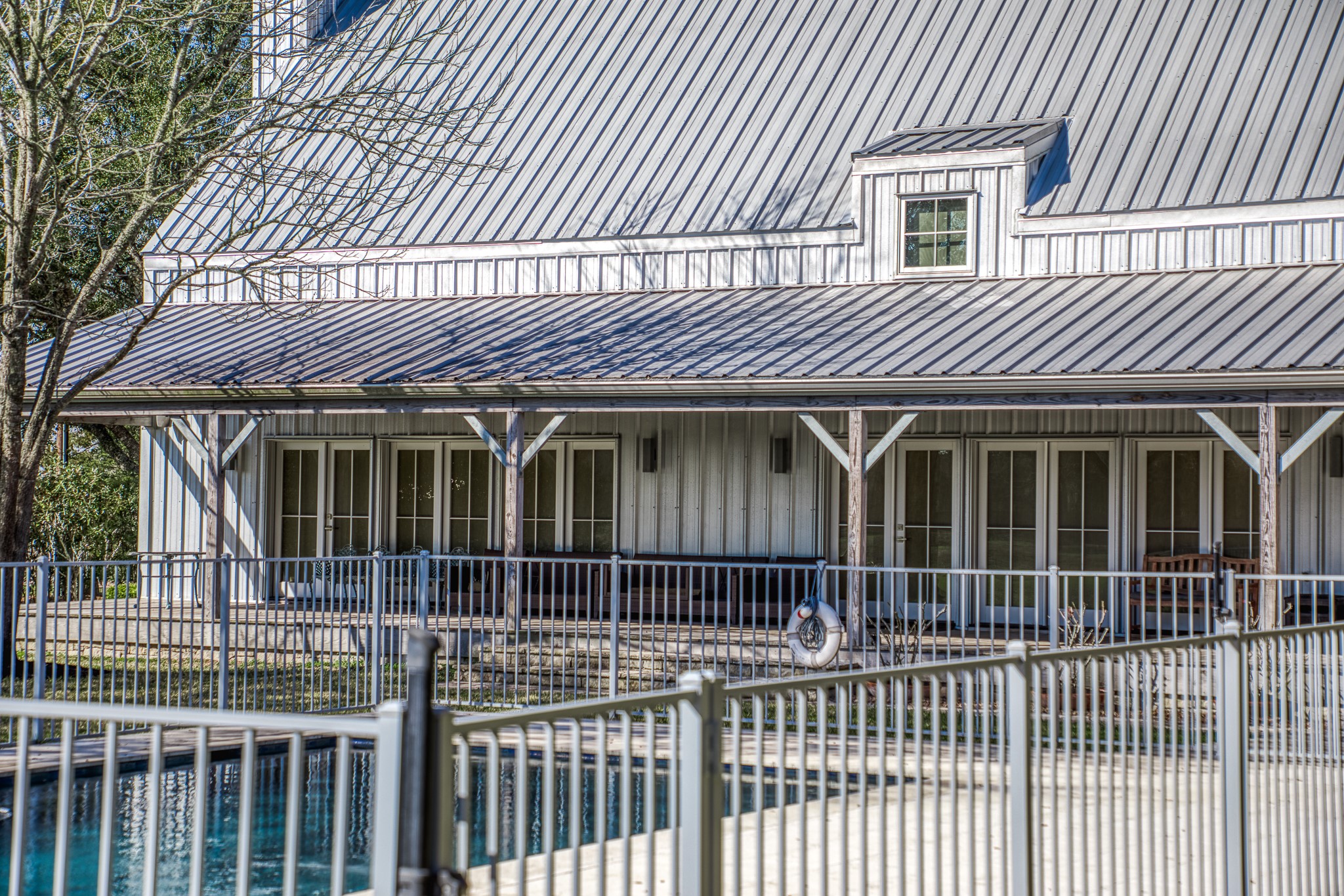 1585 Round Top Road Round Top, TX 78954 - Photo 6 of 30 a view of a house with a iron gate