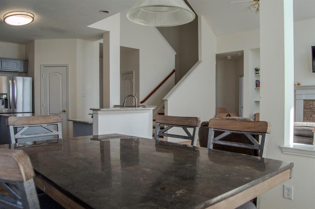 2700 Hereford Road Denton, TX 76210 - Photo 15 of 38 Dining room with stairs and ceiling fan