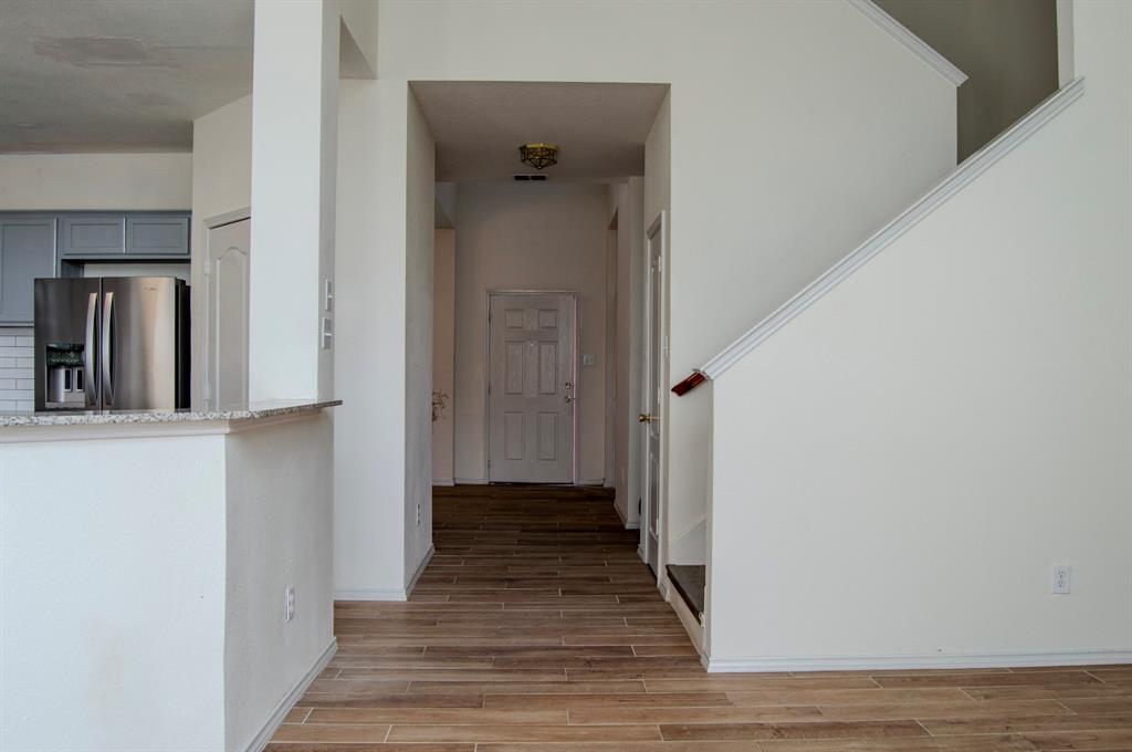 2700 Hereford Road Denton, TX 76210 - Photo 26 of 38 Hall featuring wood tiled floors