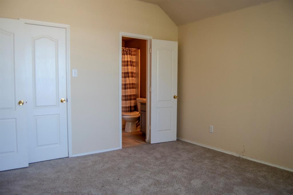 2700 Hereford Road Denton, TX 76210 - Photo 28 of 38 Unfurnished bedroom featuring carpet, ensuite bath, and vaulted ceiling