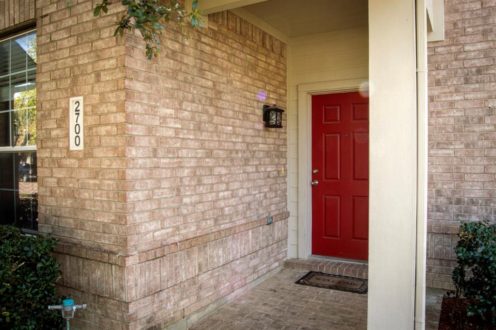 2700 Hereford Road Denton, TX 76210 - Photo 4 of 38 Property entrance with brick siding and a porch